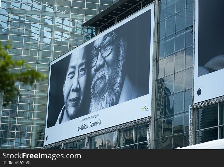 Man Beside Woman Billboard