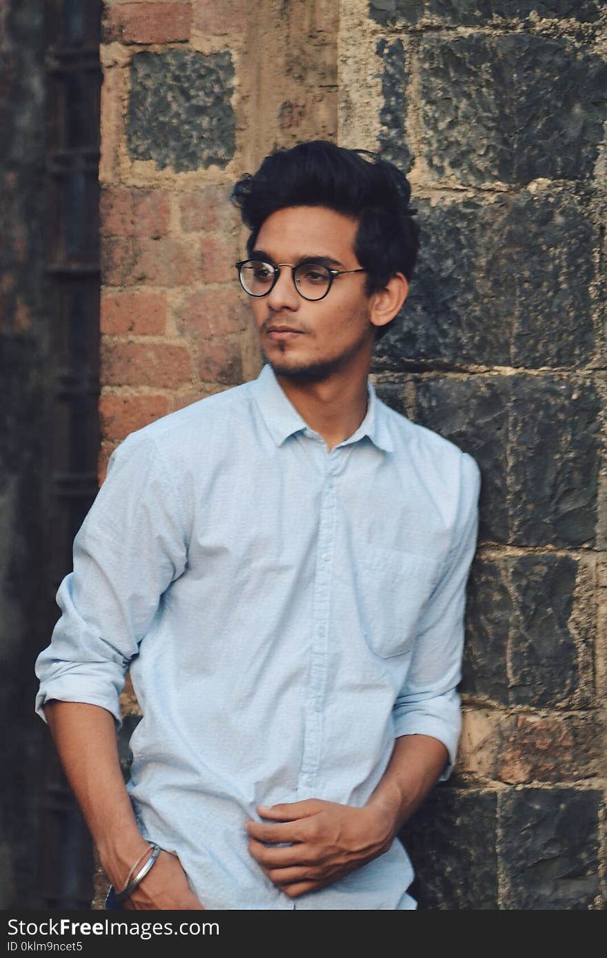 Man Wearing Blue Button-up Dress Shirt