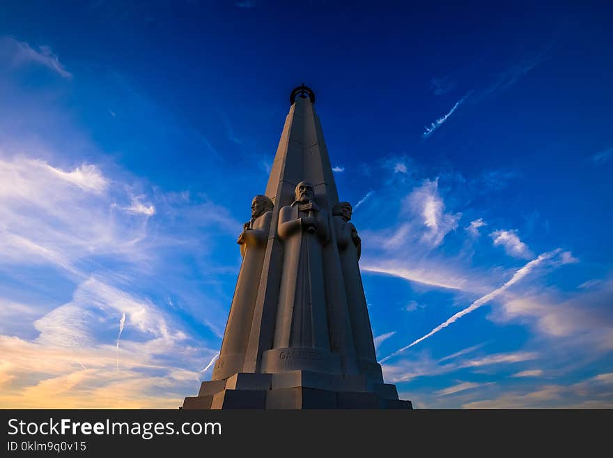 Shallow Focus Photography of Concrete Statues