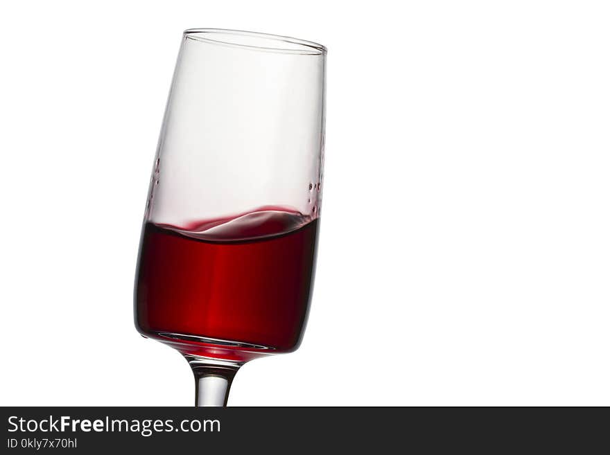 Dessert red wine splashing in an elegant glass