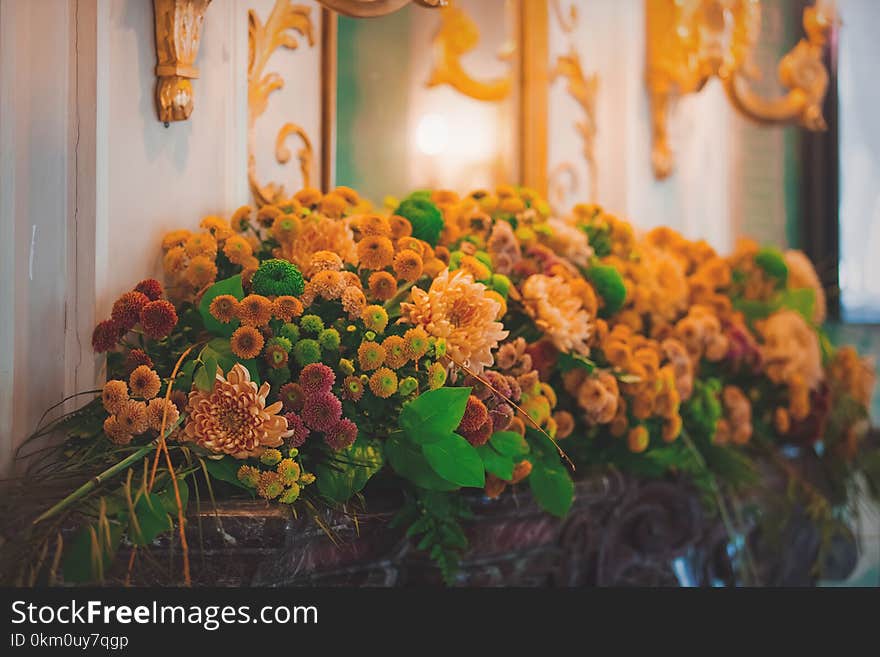 Bouquet of beautiful flowers in vase in palace