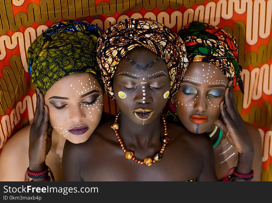 Three Women Wearing Turbands