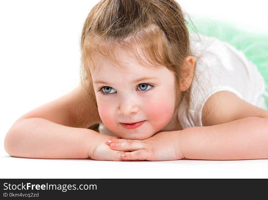 Portrait of a beautiful little girl. Face of the child close up