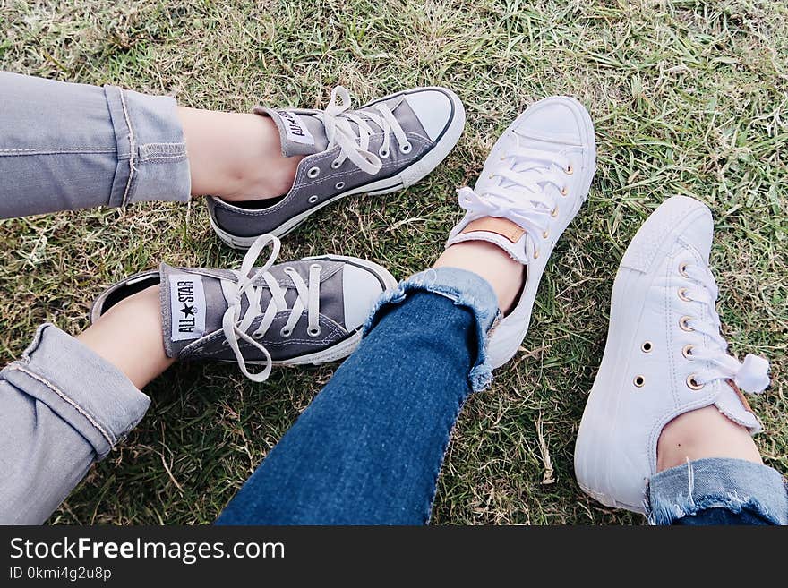 Two People Wearing Converse Allstar Low-top Sneakers