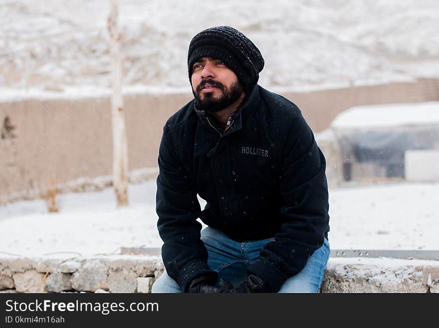 Photo of Man Sitting