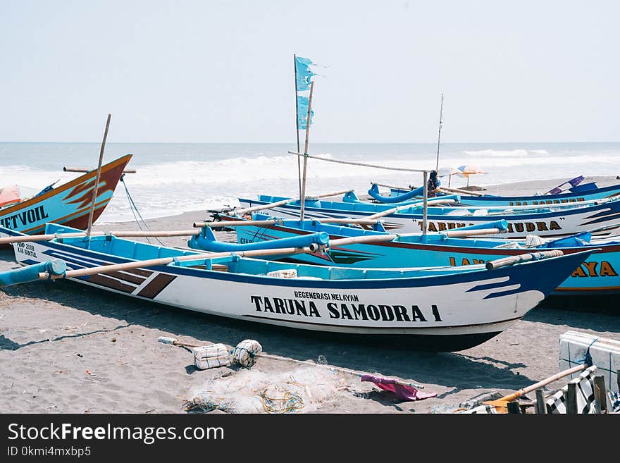 Photo of Boats Near Seashore