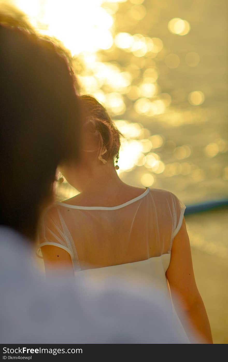 Woman Wearing White Illusion-neckline Dress