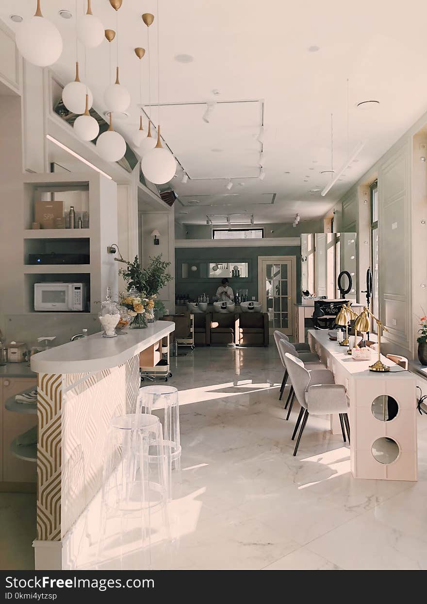 White Dining Table Near Bar Table