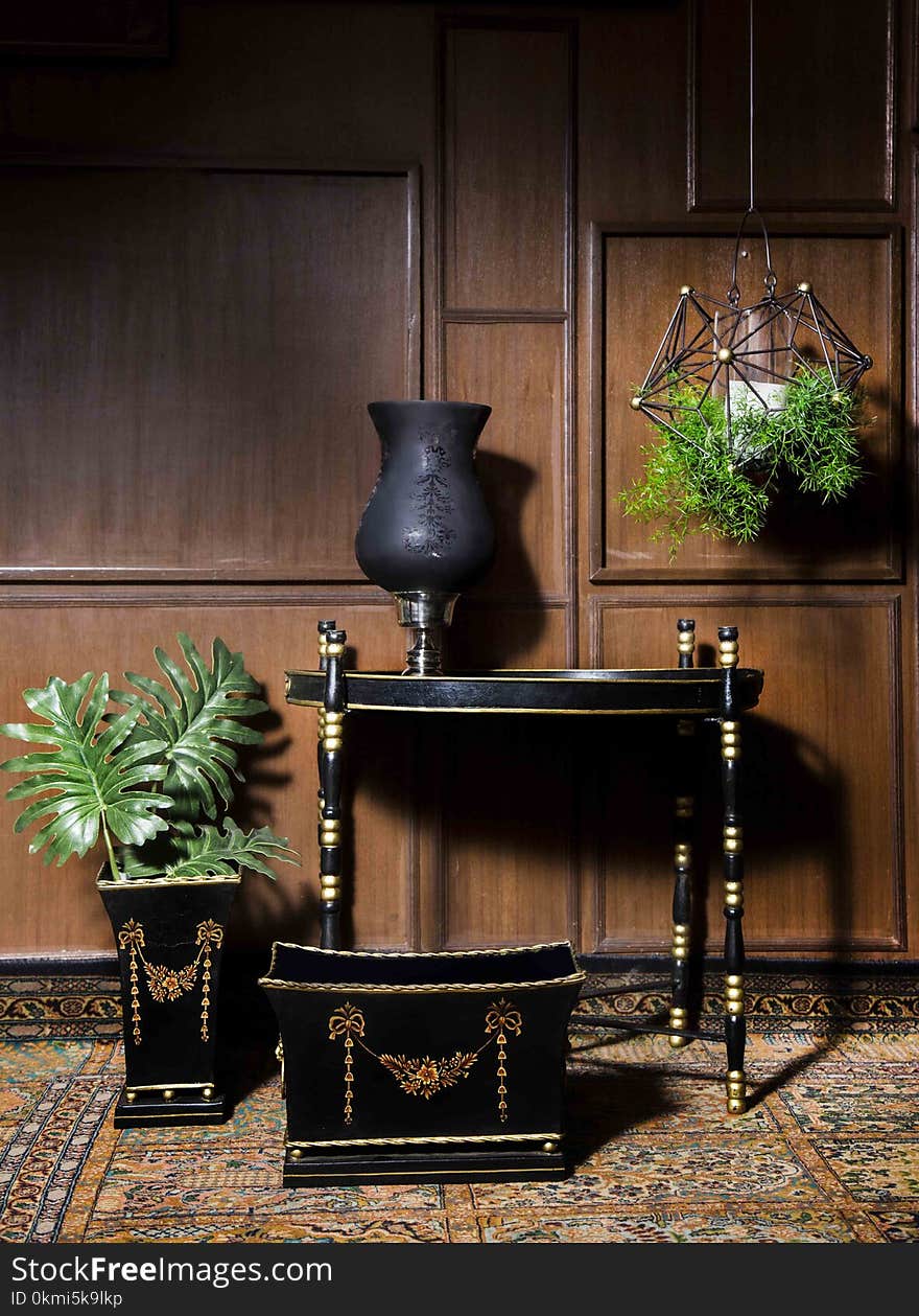 Black Wooden End Table Near Square Brown and Black Wooden Pot and Rectangular Black and Brown Wooden Trunk