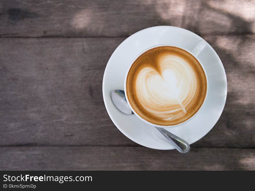 White Ceramic Cup on Saucer