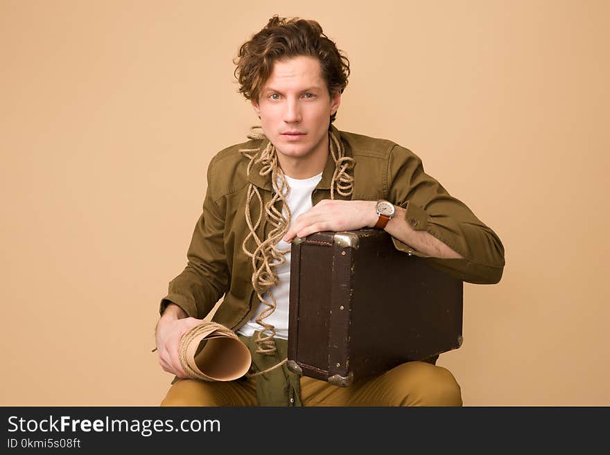 Man Holding Black Box