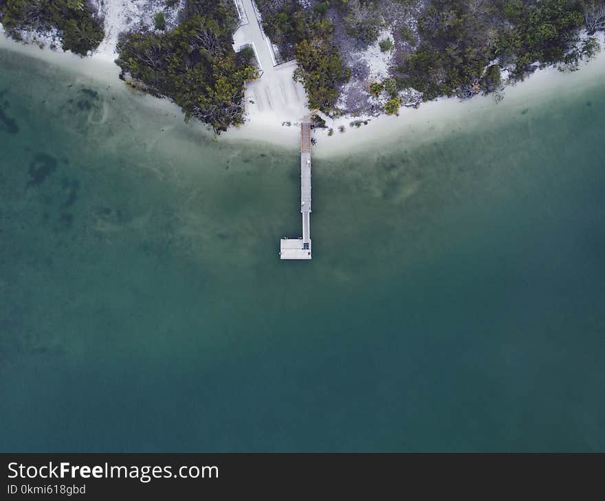 Aerial Photography of Dock on Body of Water