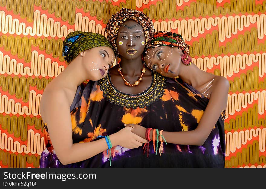 Three Women Wearing Black Clothes