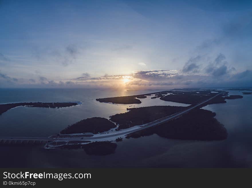 Aerial Photography of Island during Sunset