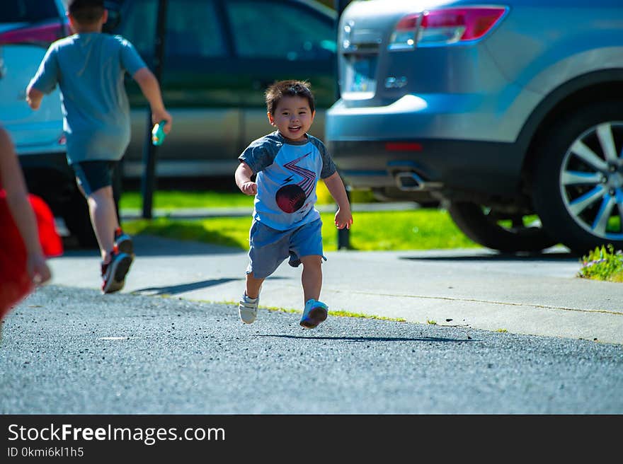 Photography of a Kid Running