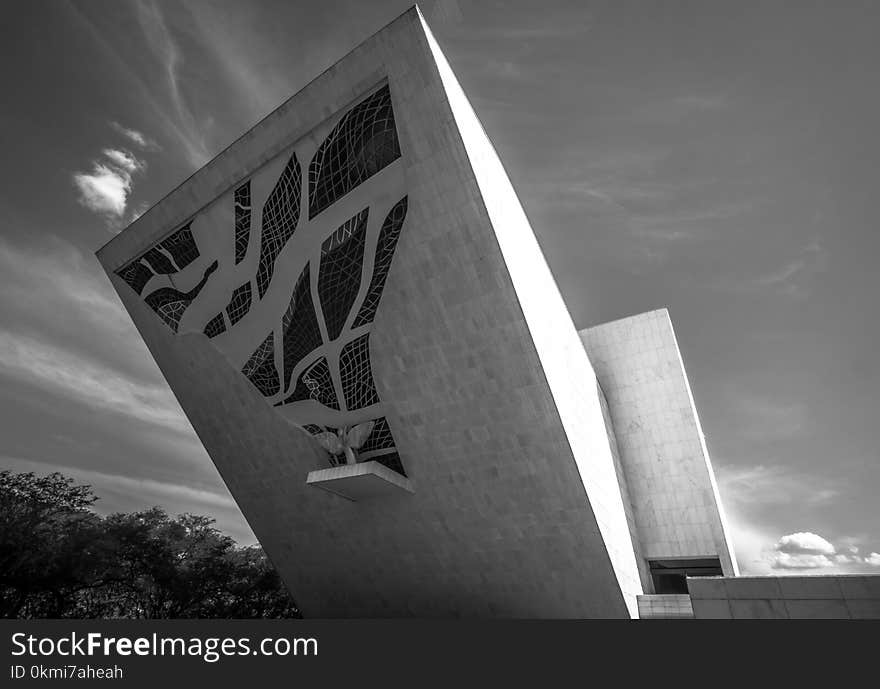 Grayscale Photo of Concrete Building