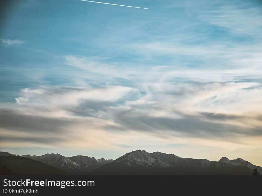 White Clouds Under Blue Skies Photo