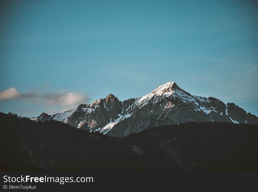 Snow-top Mountain Under Clear Sky