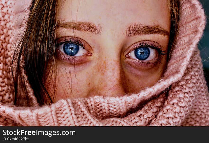 Woman With Blue Eyes Wrapped in a Pink Cloth