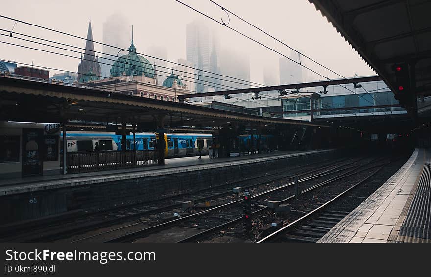 Stock Photography of Blue and White Train at Station