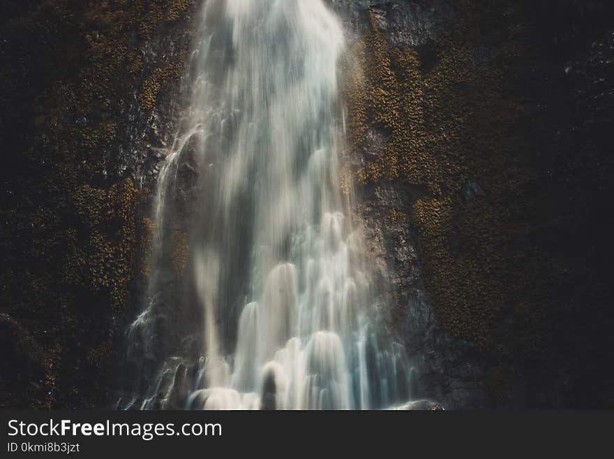 Photography of Waterfalls in Cave