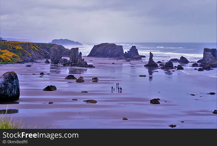 Rock Monolith on Body of Water