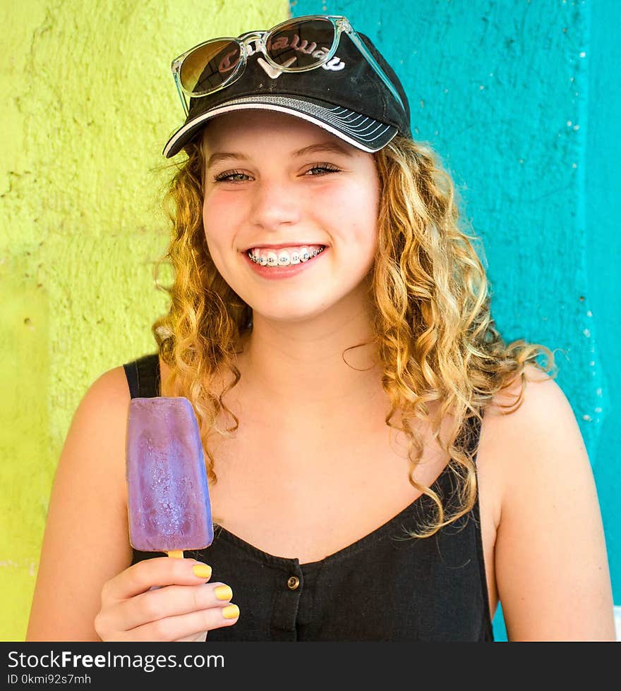 Woman Wearing Black Sleeveless Top