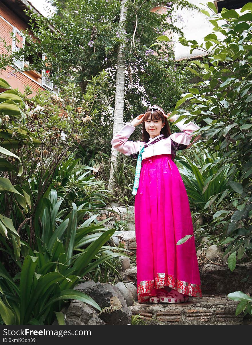 Woman Wearing Pink Long-sleeved Dress