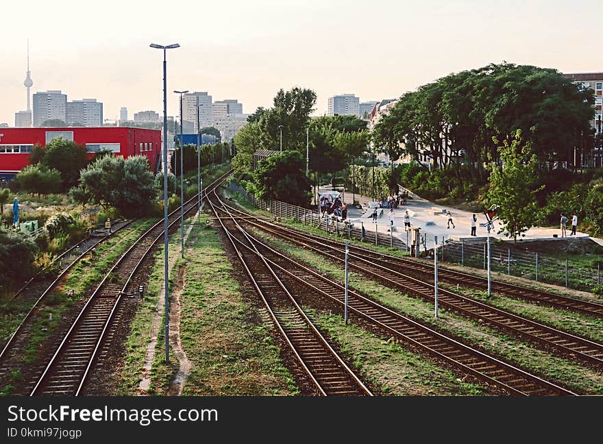 Railways Beside Red Building