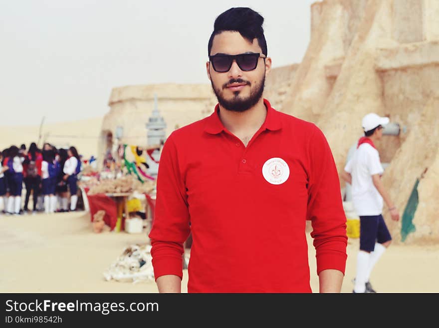 Man Wearing Red Long-sleeved Polo Shirt