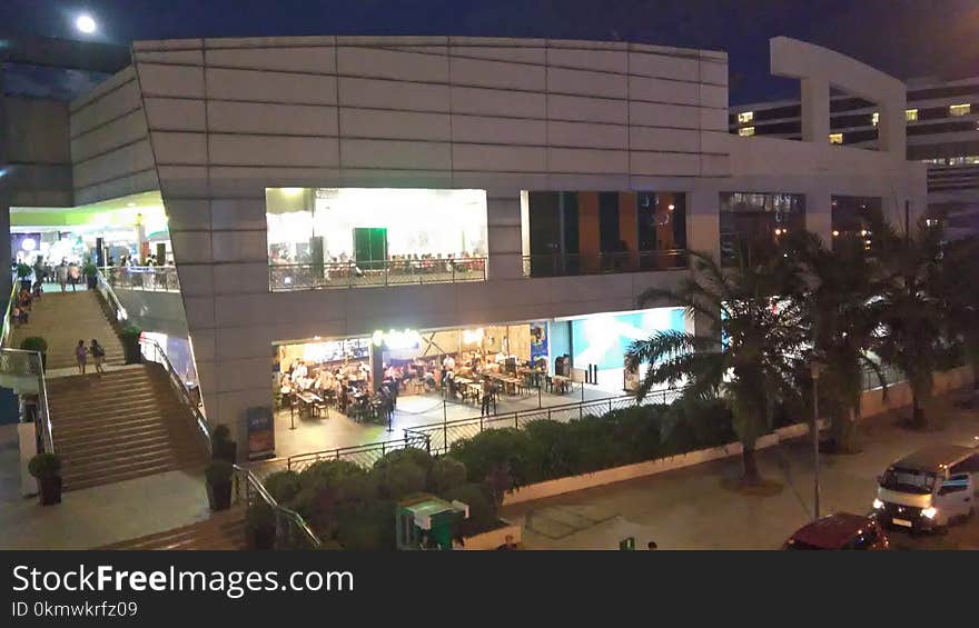 White Concrete Building during Night Time