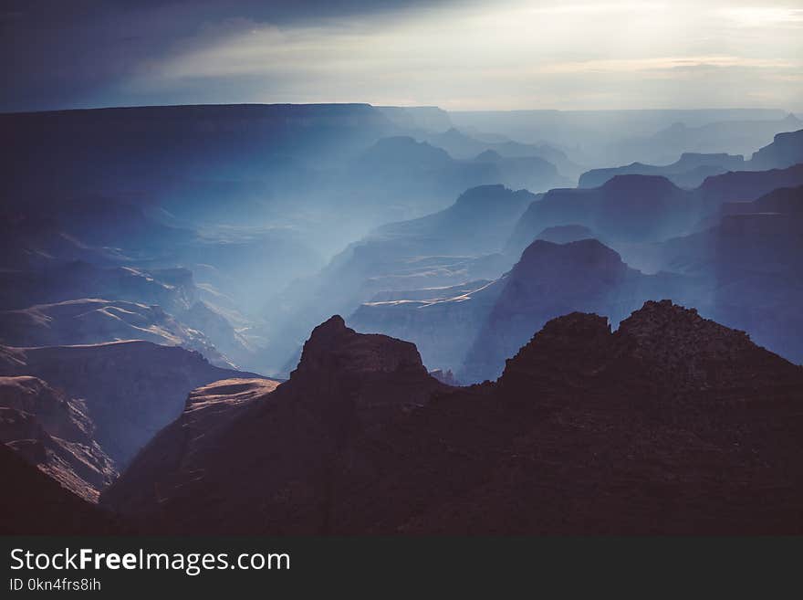 Sunset in the Grand Canyon national park, USA. Light going through the clouds. Sunset in the Grand Canyon national park, USA. Light going through the clouds.