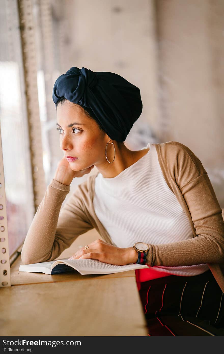 Photo of Woman Wearing Blue Headdress