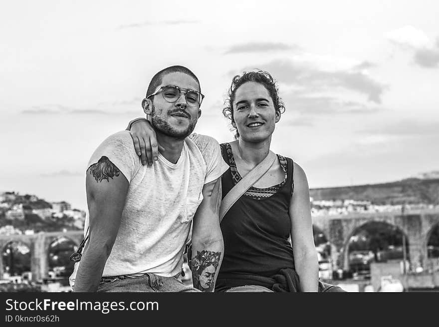 Grayscale Photograph of Man and Woman