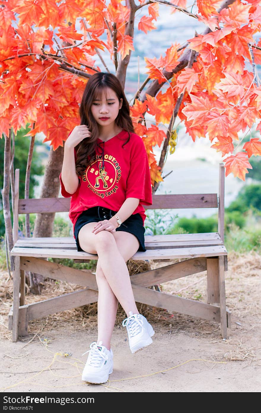 Woman Wearing Red V-neck Shirt