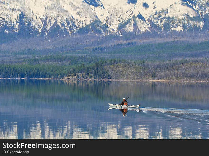 Man Riding on a Boat