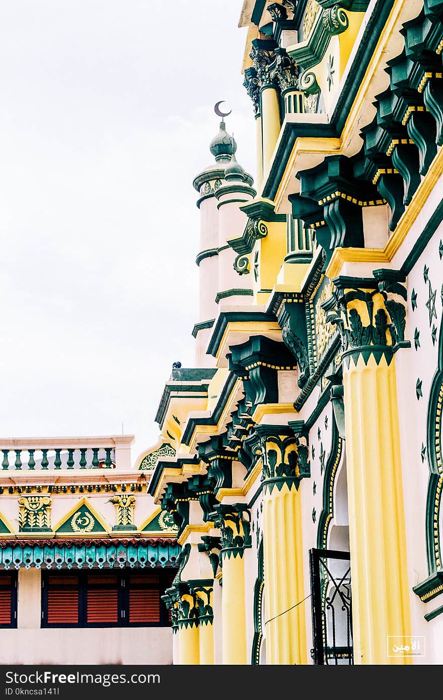 Green and Yellow Painted Building