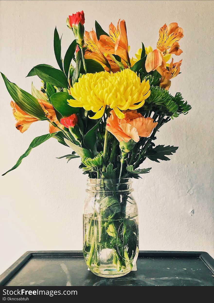 Yellow Mums, Orange Peruvian Lilies, and Carnation Flower Arrangement