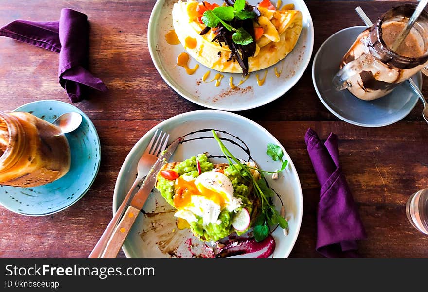 Vegetable Dish in White Plate on Brown Table