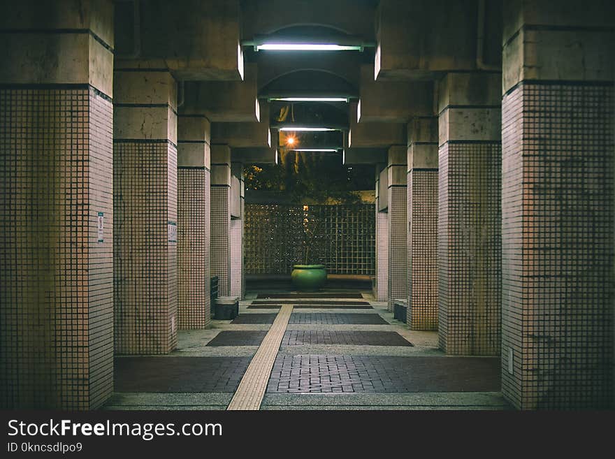 Photo of Brown Concrete Hallway