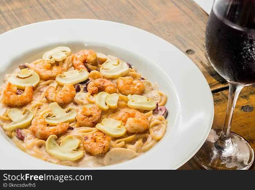 Mushroom Soup on Plate Beside Wine Glass