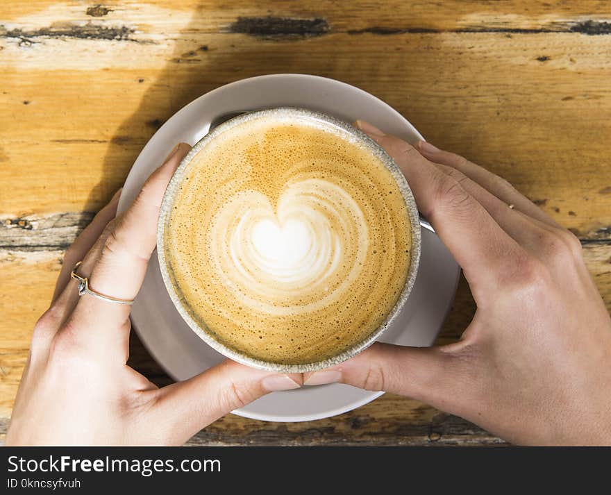 Brown and White Latte on White Ceramic Cup