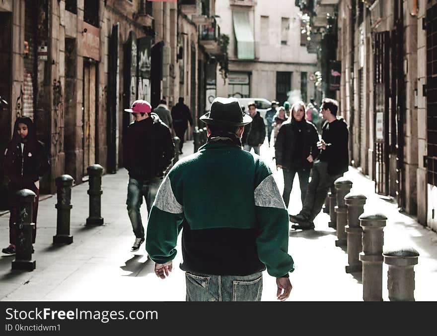 Man Wearing Green Jacket