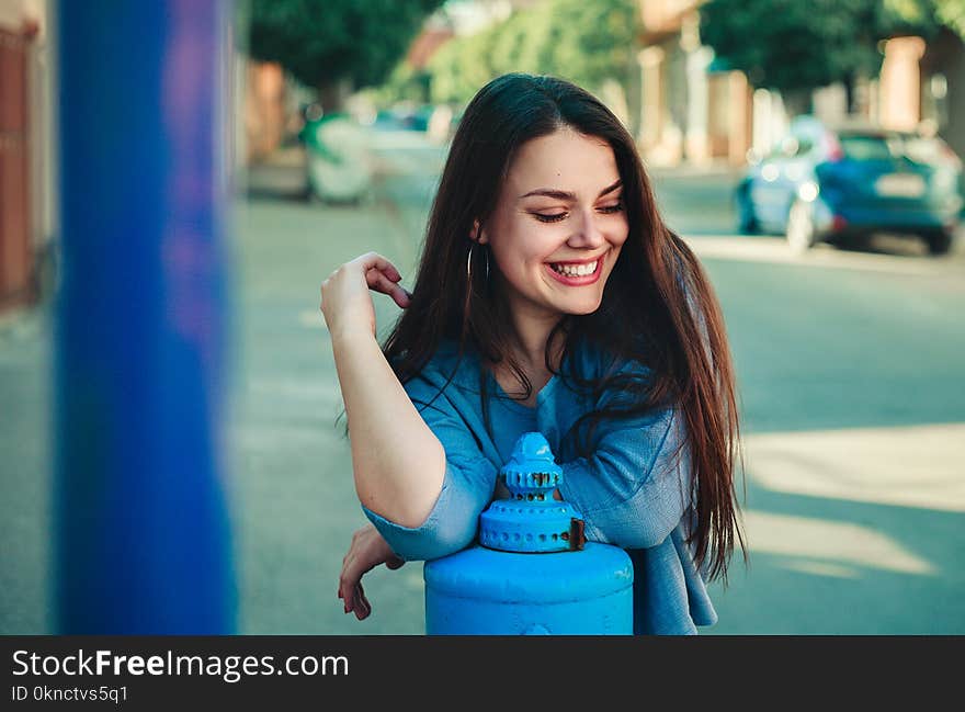 Woman Wearing Blue Long-sleeved Shirt