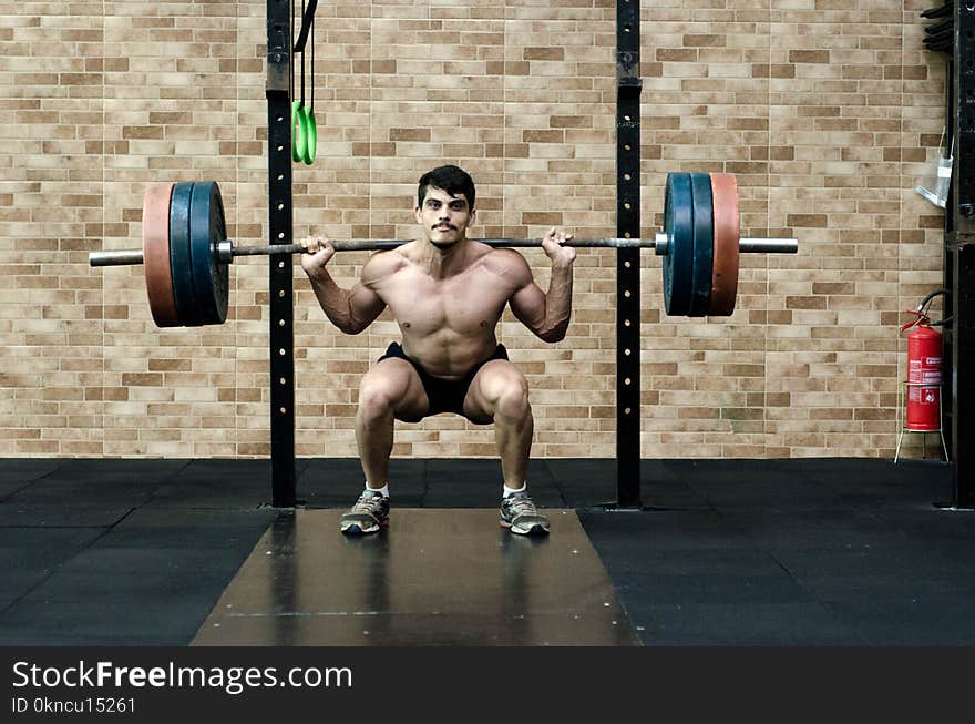 Man Lifting Barbell