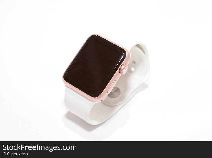 Rose Gold Aluminum Case Apple Watch With White Sports Band