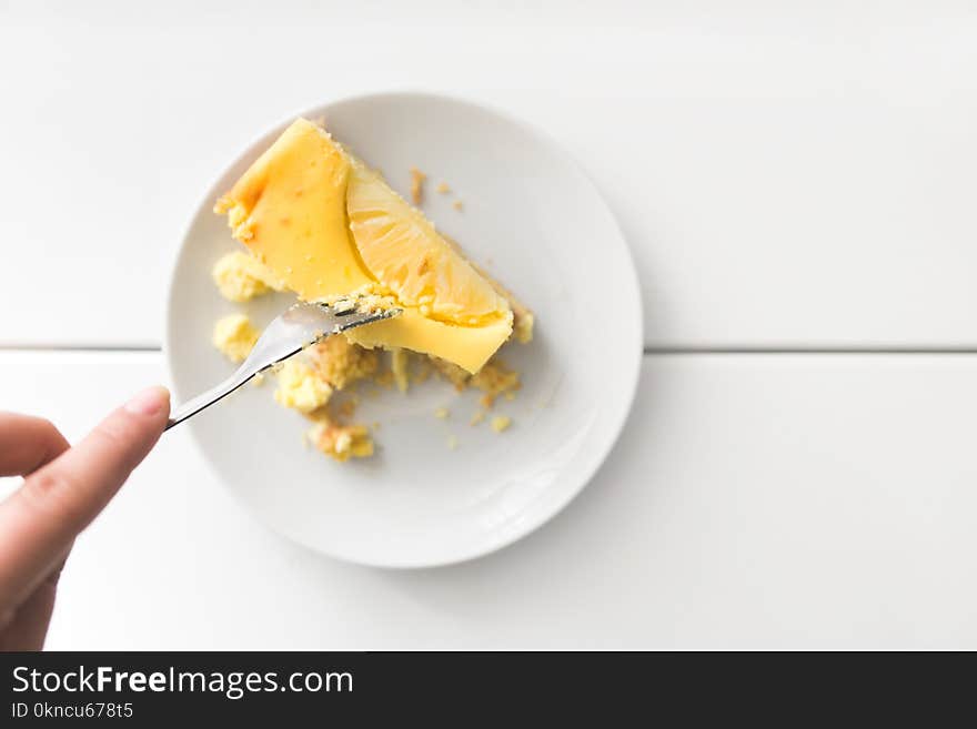 Sliced Dessert on Top of White Ceramic Plate