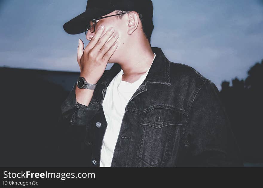 Man Wearing Black Button-up Denim Dress Shirt