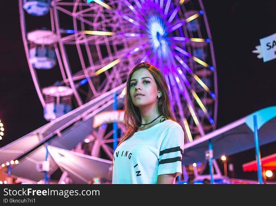 Low-angle Photography of Female on Carnival