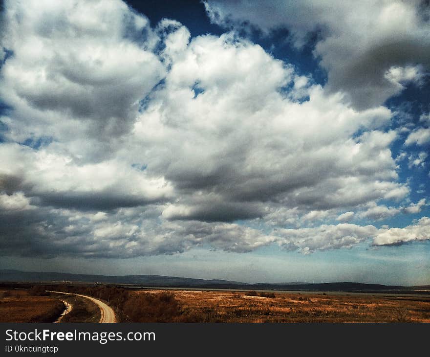 Road Under Clouds Panoramic Photography